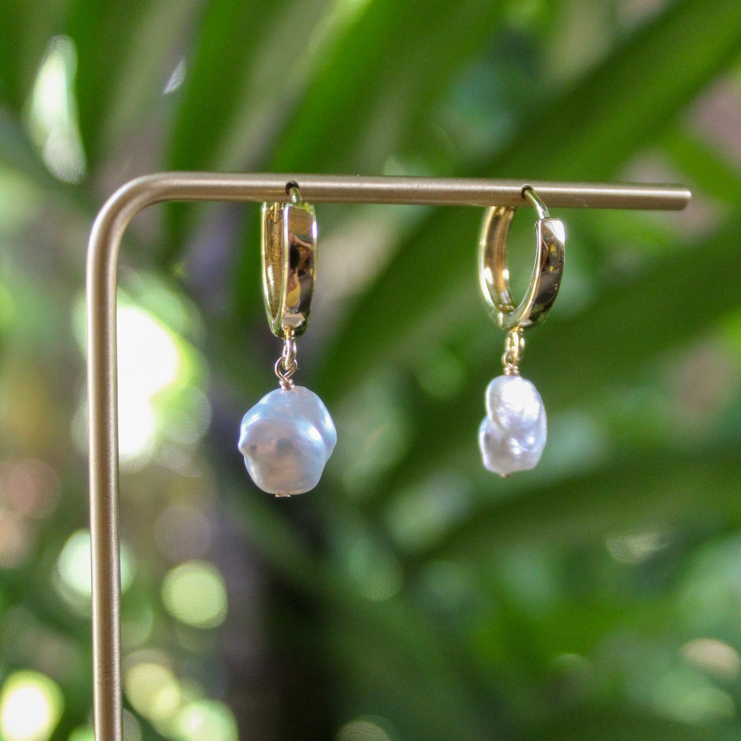 og pearl huggies (gold fill)