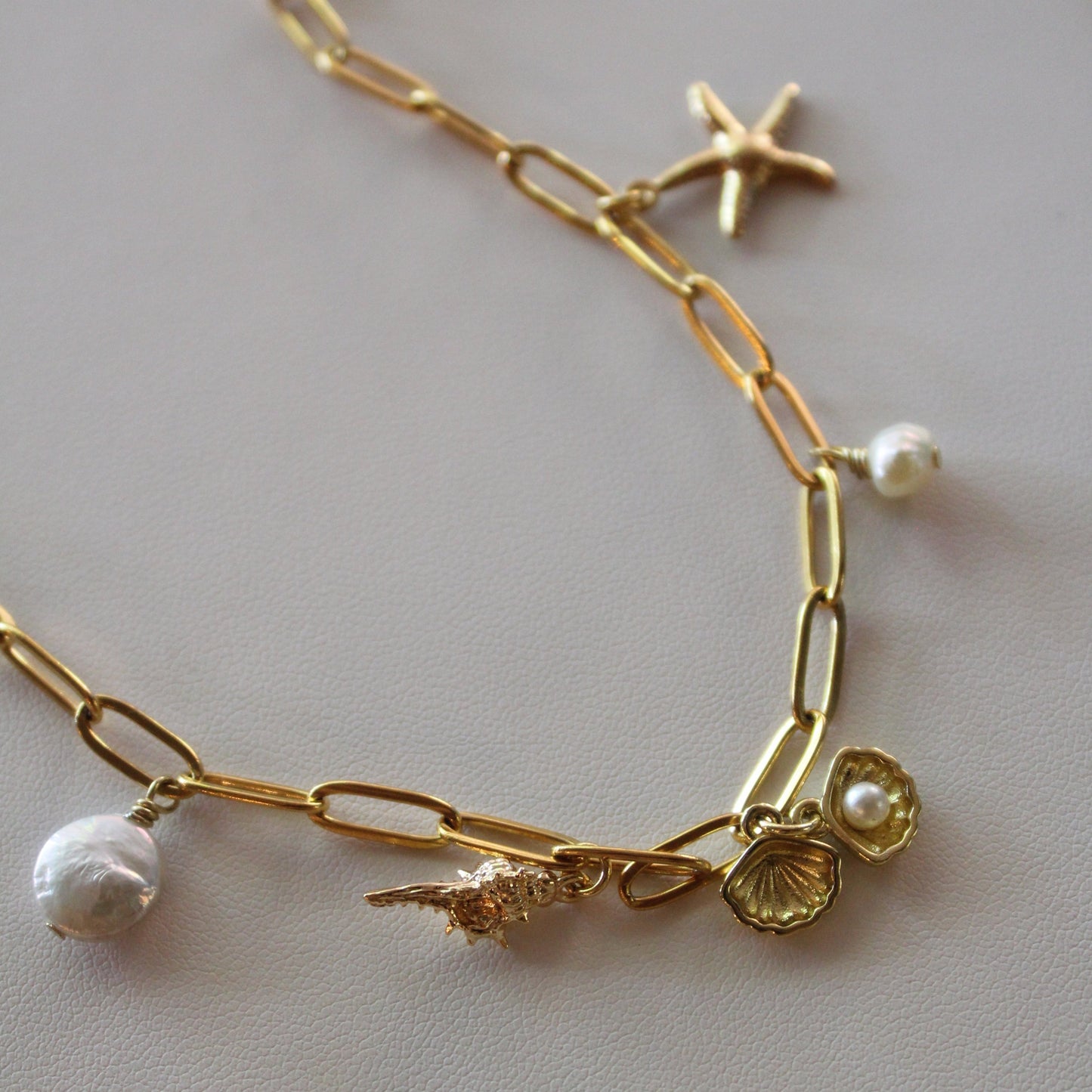 gold plated shoreline charm necklace